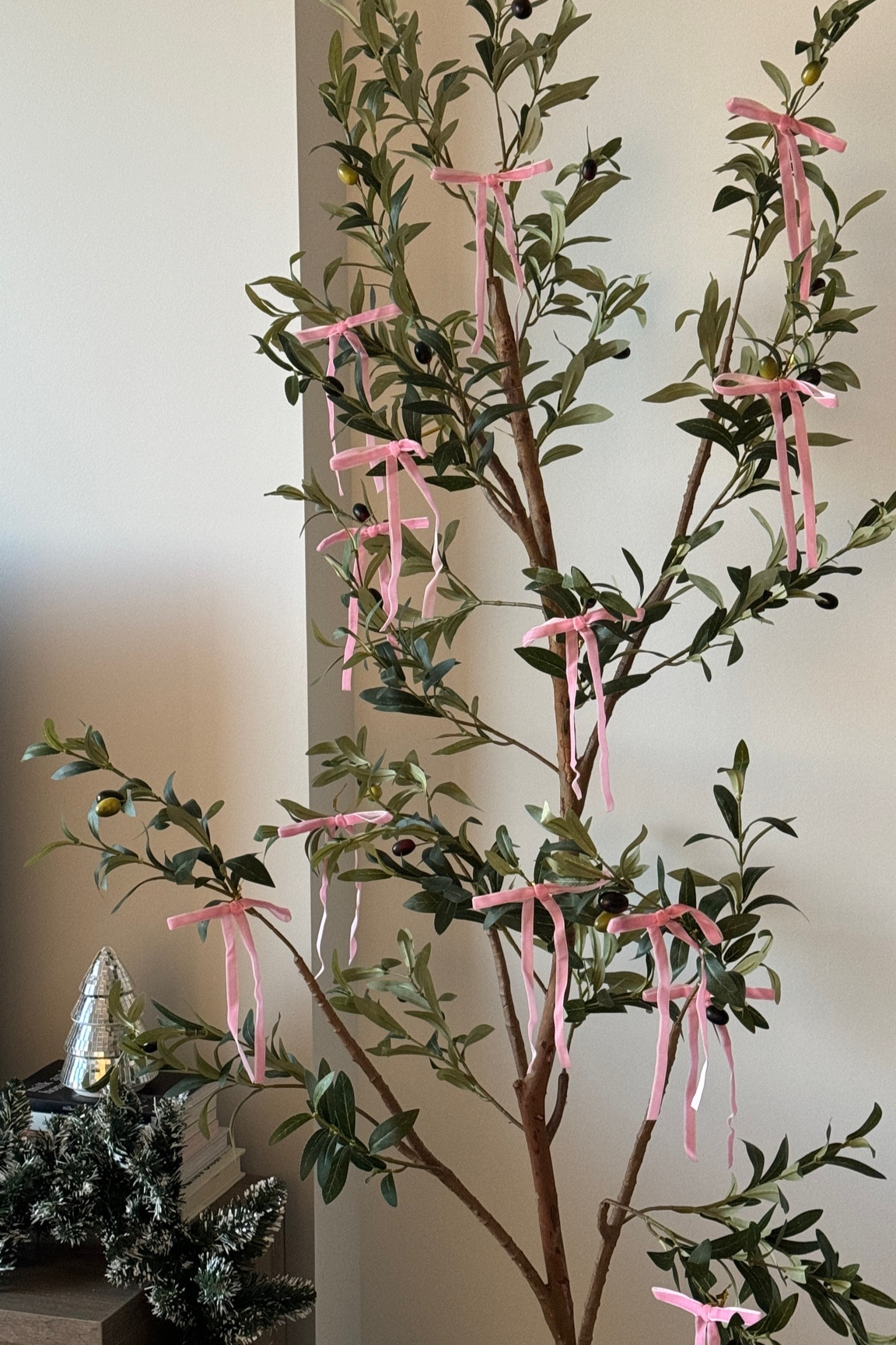 Couldn’t leave my olive tree un-decorated for Christmas! 🎄🎀 Added these velvet bows and they turned out sooo cute - it’s a 30 pack of bows so I’ll us the rest on my actual Christmas tree! 

#LTKwinter