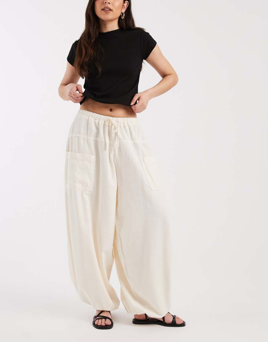 ASOS DESIGN tie waist casual balloon pants in white | ASOS (Global)