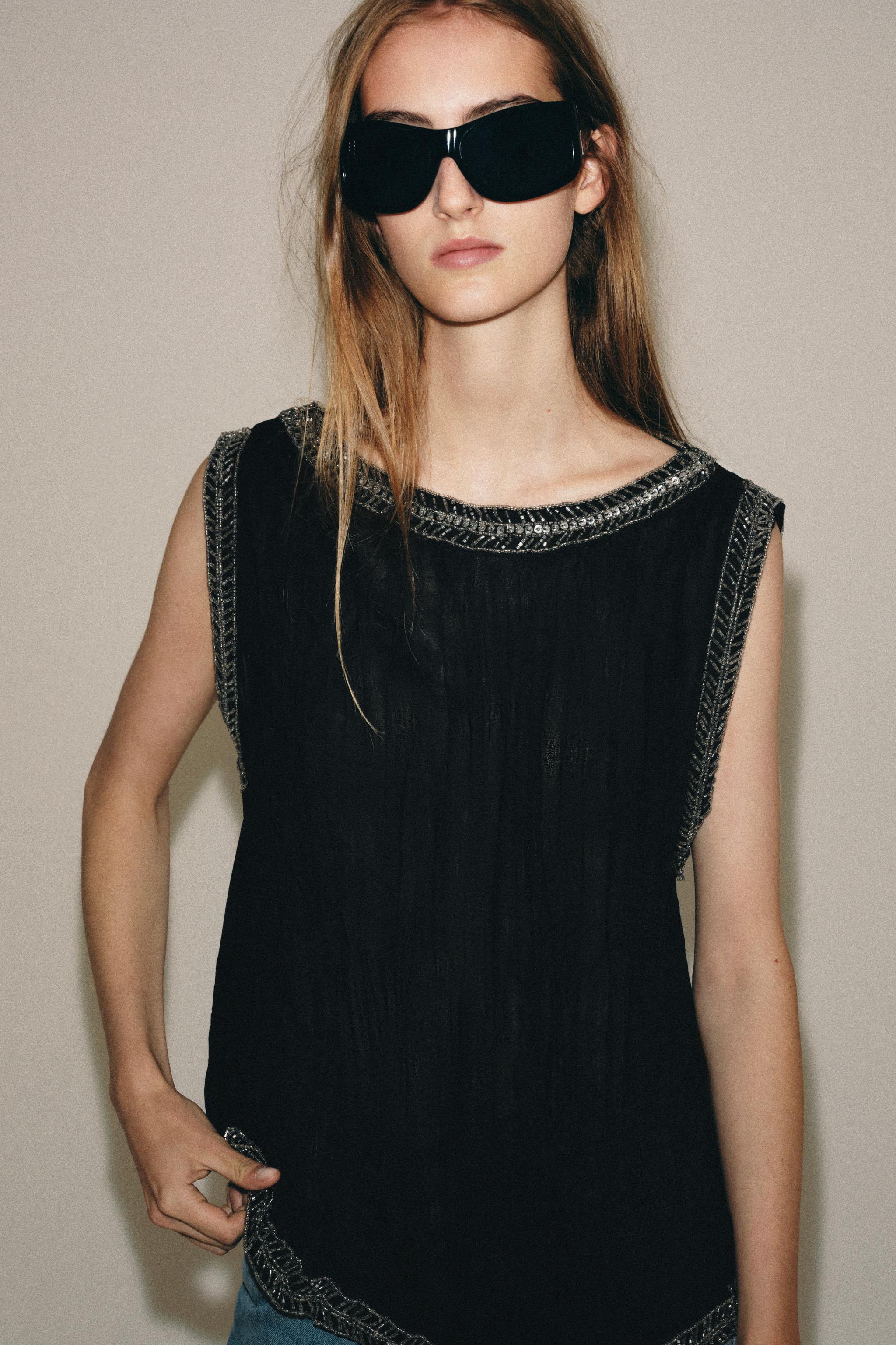 ZARA WOMAN COLLECTIONTop made with a main viscose yarn fabric. Round neckline and sleeveless. Ton... | Zara US