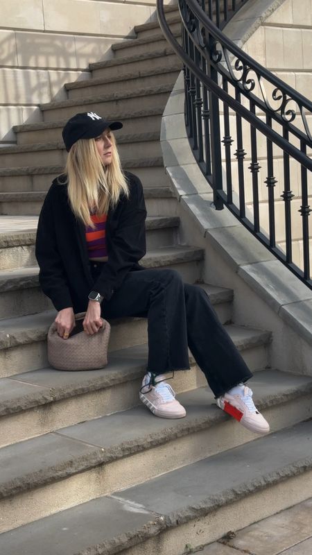 Simple spring outfit check. Casual and comfy street style 

Black white leg jeans • black shacket • wide leg jeans • beaded bag • black hat • pink sneakers • off white sneakers • striped sweater 

#LTKVideo #LTKStyleTip