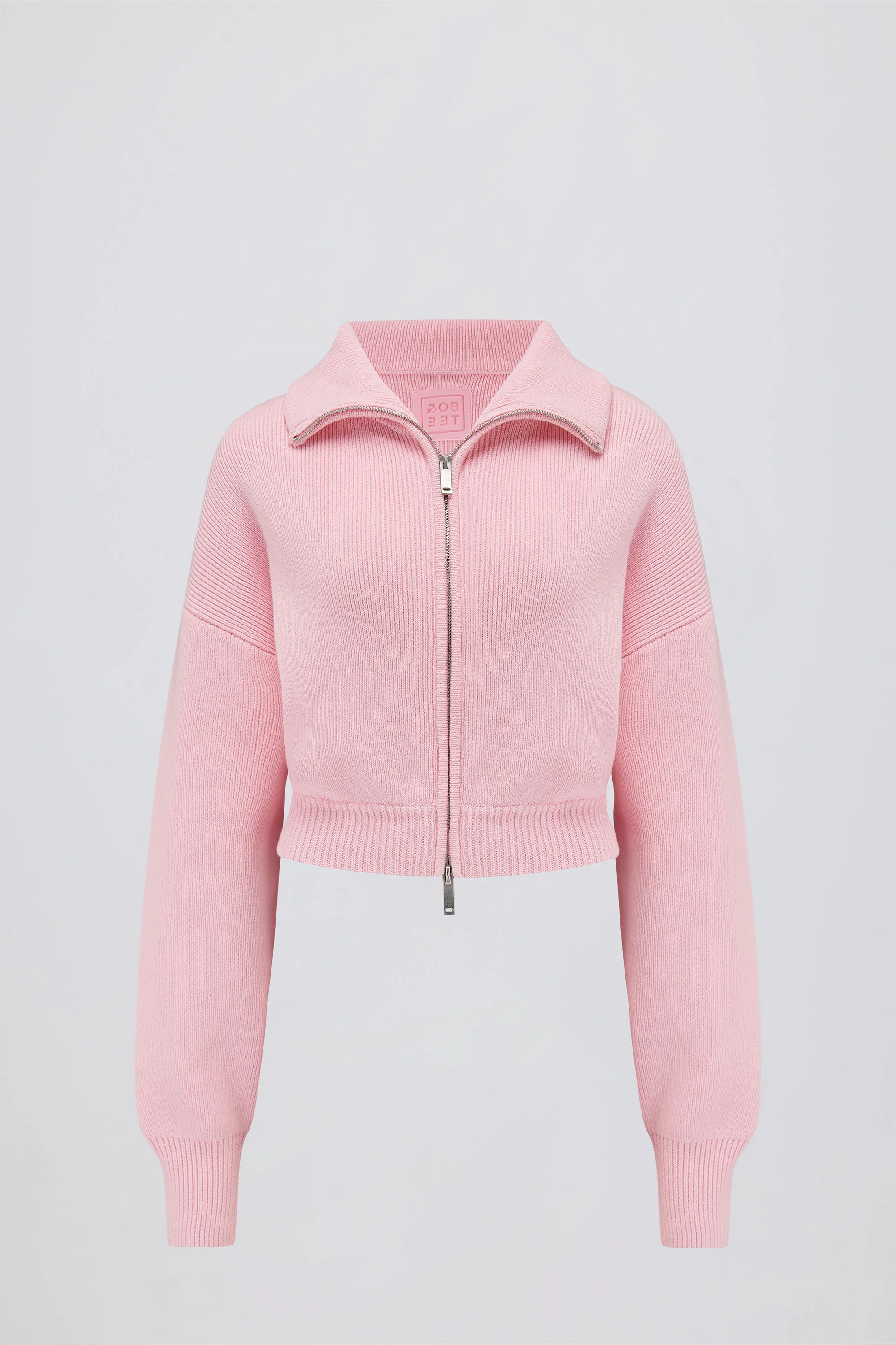 Ribbed-Knit Cropped Zip-Up Sweatshirt in Pale Pink | Oh Polly