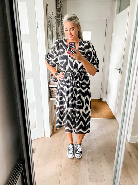 Outfits of the week. A beautiful cotton black and white printed v-neck dress with puff sleeves and a drawstring waist. Paired with black Chuck Taylor Converse All Stars. Size info in review. 



#LTKunder50 #LTKmidsize #LTKover40