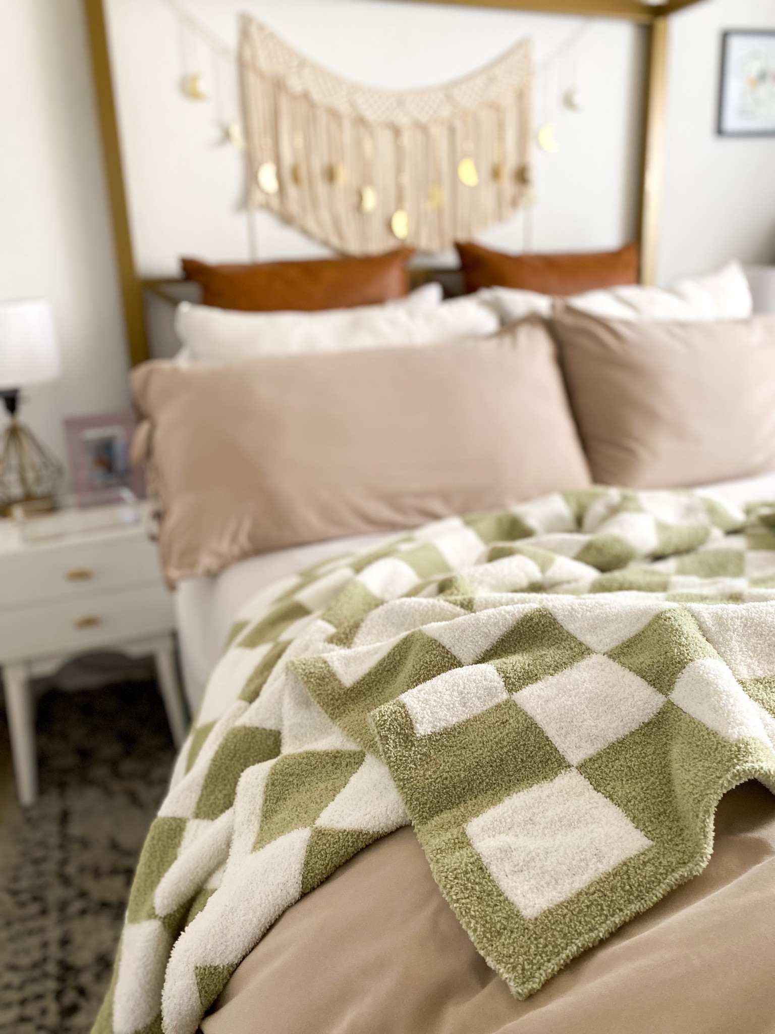 This Sage green is such a gorgeous color. Checkers are always fun and a great way to make your space pop. 
The quality is unbelievable and the texture + coziness of this throw is pretty dang amazing. Highly recommend, worth the splurge. I can see why it’s so popular! Comes in different color options as well  

#amazonfinds #fallfinds #founditonamazon #viralthrow 

#LTKHalloween #LTKSeasonal #LTKhome