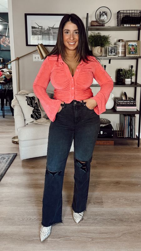 Cute top + skinny jeans=Super sexy (but easy and casual) date night look❤️‍🔥 This pink top from Amazon is perfect for Valentine's Day or Galentine's Day. ﻿Obsessed with the bell sleeves, and it's fuller bust friendly!

This top is super flattering and stretchy so it's not super tight on my chest (I'm a 34ddd).  I don't feel like it's showing off my belly. he length is perfect and would work with a short long torso. You could pair with high-rise or mid-rise skinny jeans or pants.﻿﻿﻿ ﻿I styled it with heeled booties but heels would be great too.

﻿Comes in a ton of colors. ﻿﻿I'm wearing a size small in the Rose color and a size 27 Short in the skinny jeans. #datenight #vdayoutfit #outfitinspo #galentinesday #amazonoutfit #amazonfinds

#LTKfindsunder50 #LTKSeasonal #LTKmidsize