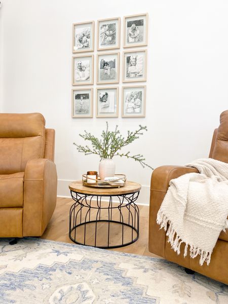 Living room decor, living room ideas, gallery wall, picture wall, picture frames, coffee table, modern farmhouse decor, leather recliner, camel leather, camel chair, leather chair, winter decor

#LTKhome #LTKSeasonal