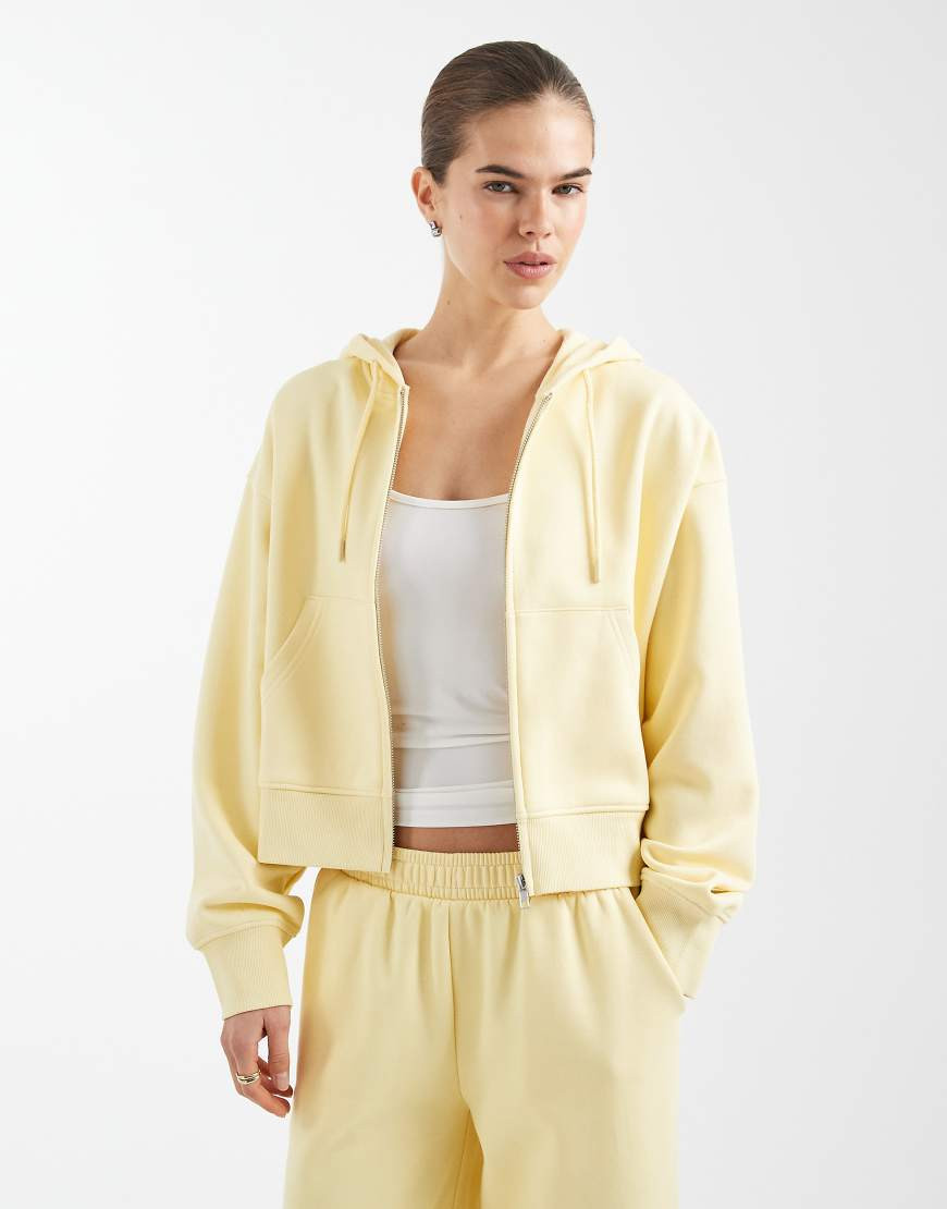 ASOS DESIGN cropped zip up brushback hoodie in yellow | ASOS (Global)
