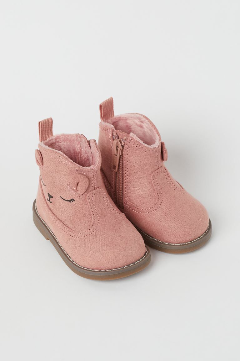 Warm-lined ankle boots with zip at one side and loop at back. Soft faux shearling lining and inso... | H&M (US + CA)
