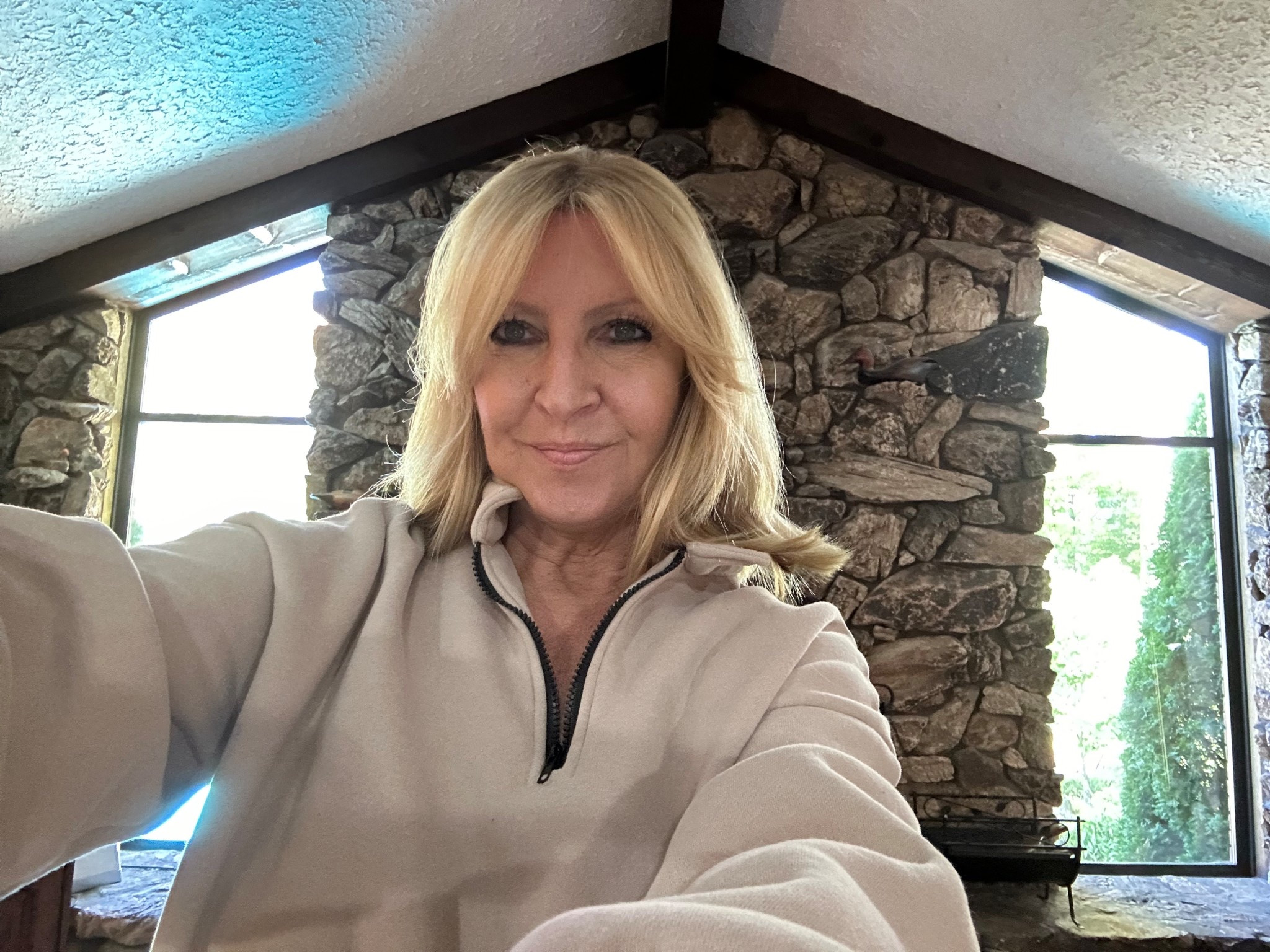 Is it starting to cool off where you live? I absolutely love the fall. I like to bundle up and be cozy. (Over sweating! 🥵)  Anyway, this is my Trendy Queen quarter zip that I love. It is in the coffee gray color.