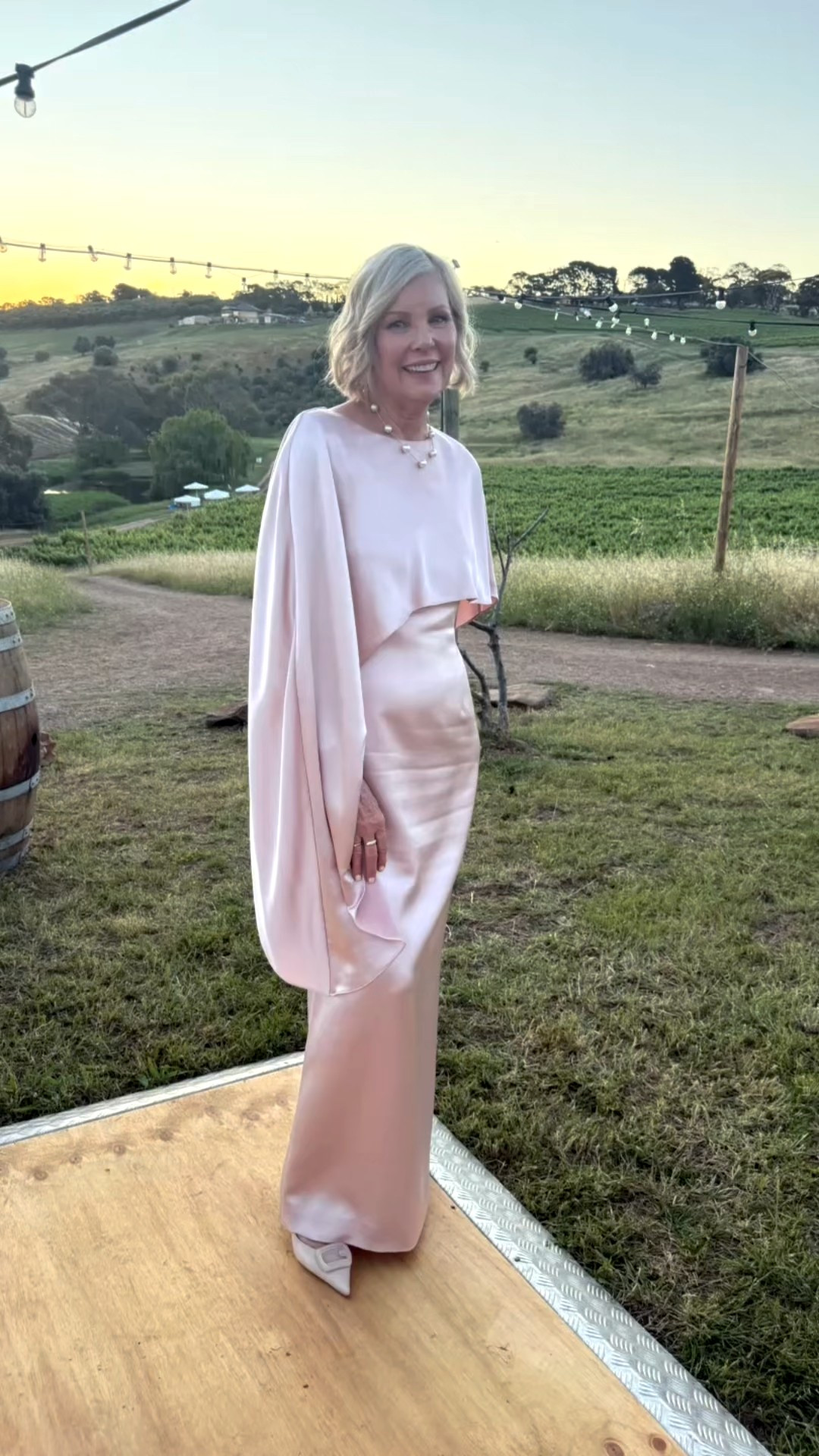 MY MOTHER OF THE BRIDE DRESS!
This Mother of the Bride dress had everything I’d been looking for, sleeves, the perfect blush tone, and that stunning cape that became the true hero of the look. 
And, as fate would have it, the shoes I loved worked perfectly with it.

Linda 175cms wears Size 12  

#LTKover50style #LTKaustralia #LTKwedding