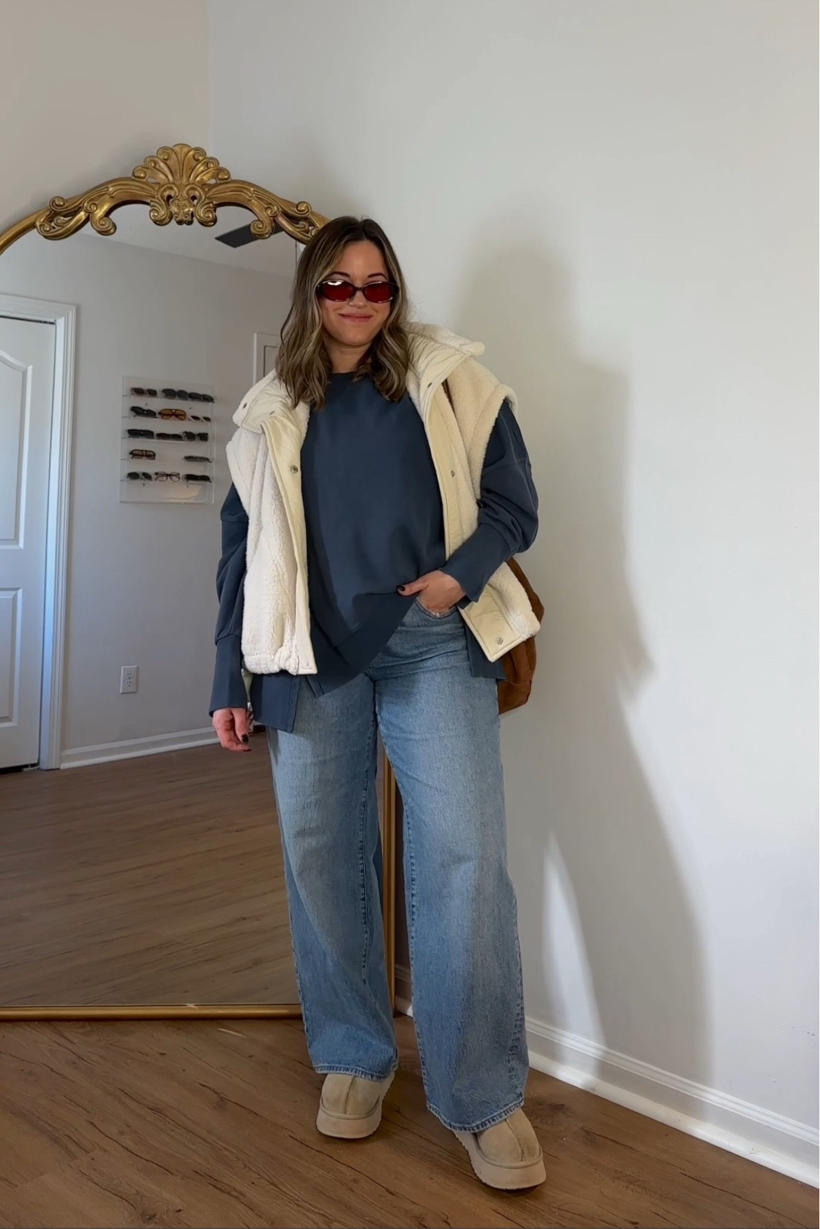 Casual winter outfit idea — perfect for staying cozy but can take off layers if indoors 🤌🏼

Vest- medium, linking a more affordable option as well

Sweater- large, sized up. Use code 25KACEY at JCPenney

Jeans- sized up, but order your regular size if you like your jeans more fitted 

Tazz Uggs - recommend sizing up 1 size if you’re in bw sizes or plan on wearing chunky socks  


#LTKSeasonal #LTKFindsUnder50 #LTKWatchNow