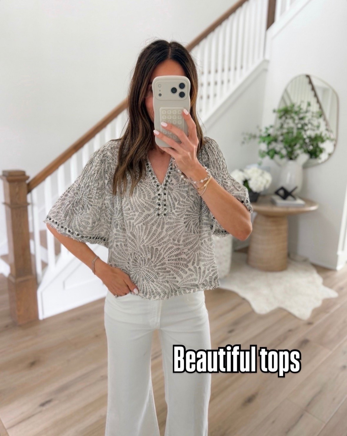 This top immediately caught my eye 🤍 The print feels so chic and expensive looking, and I love how easy it is to throw on with white denim for a polished everyday look. One of those tops that makes a simple outfit feel special.

Printed blouse, chic tops, white jeans outfit, elevated casual style, neutral outfits, spring and summer fashion, effortless style, boutique fashion, everyday outfit ideas, feminine tops, casual chic outfits, classy everyday style, annabrstyle

#LTKootd #LTKSeasonal #LTKOver40