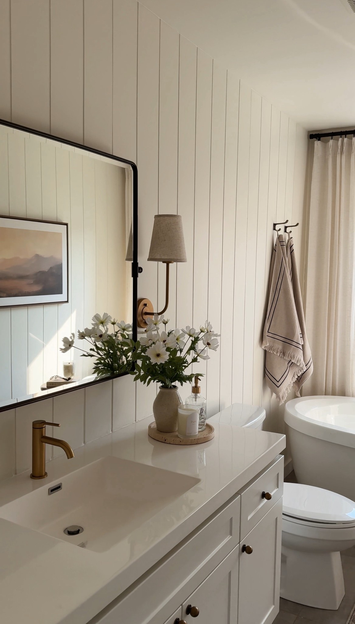 The serene bathroom oasis of my builder home dreams.. a full cart from @wayfair was all I needed to bring my initial vision to life. With a simple click of the button everything I needed arrived at my door quick & easy to help us meet our short deadline for this project. #Wayfair #WayfairPartner
