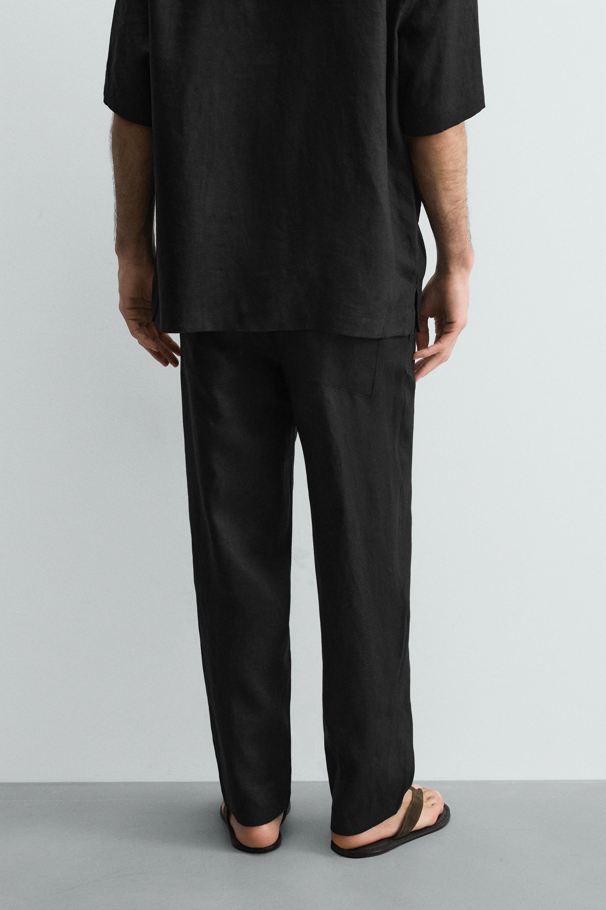 Model height: 185 cmRelaxed fit trousers made from linen fabric. Featuring an elasticated drawstr... | Zara UK