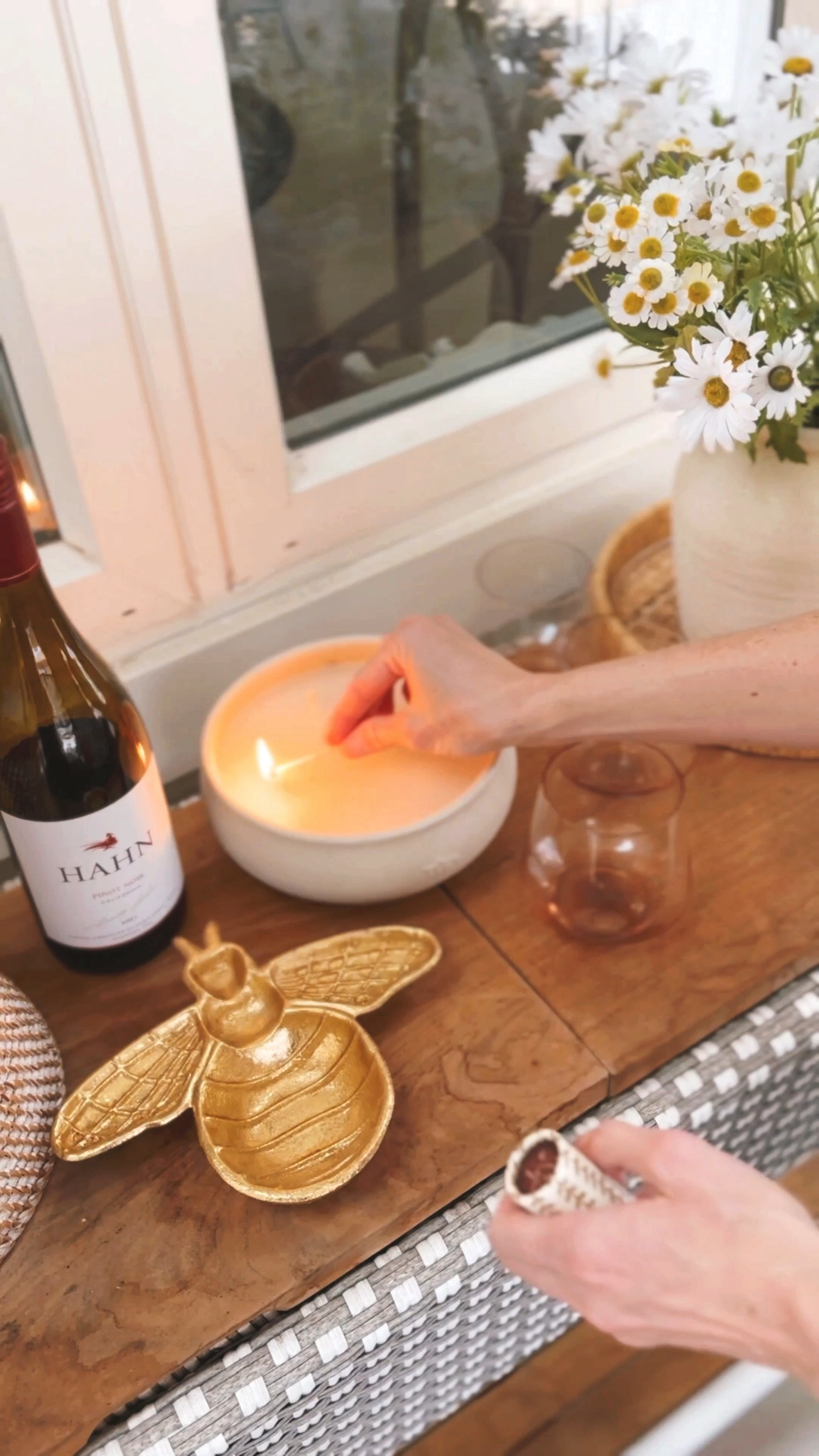 #ad Lowe’s (@LowesHomeImprovement) Spring Outdoor entertaining favorites for my patio console! I love this brass bee dish, citronella candle, faux daisies, rose colored stemless wine glasses and woven tray. Perfect for all backyard entertaining!☀️ #lowespartner  #loweshomeimprovement #backyardpatio #patio #entertaining #spring

#LTKSeasonal #LTKhome #LTKVideo