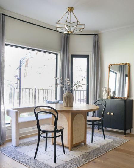 Breakfast nook decor featuring my cute black storage cabinet from Wayfair that’s under $250 and perfect for small spaces! 

bistro table, round kitchen dining table, bistro chairs, dining bench, Amazon curtains, unique pendant light 

#LTKhome #LTKsalealert #LTKstyletip