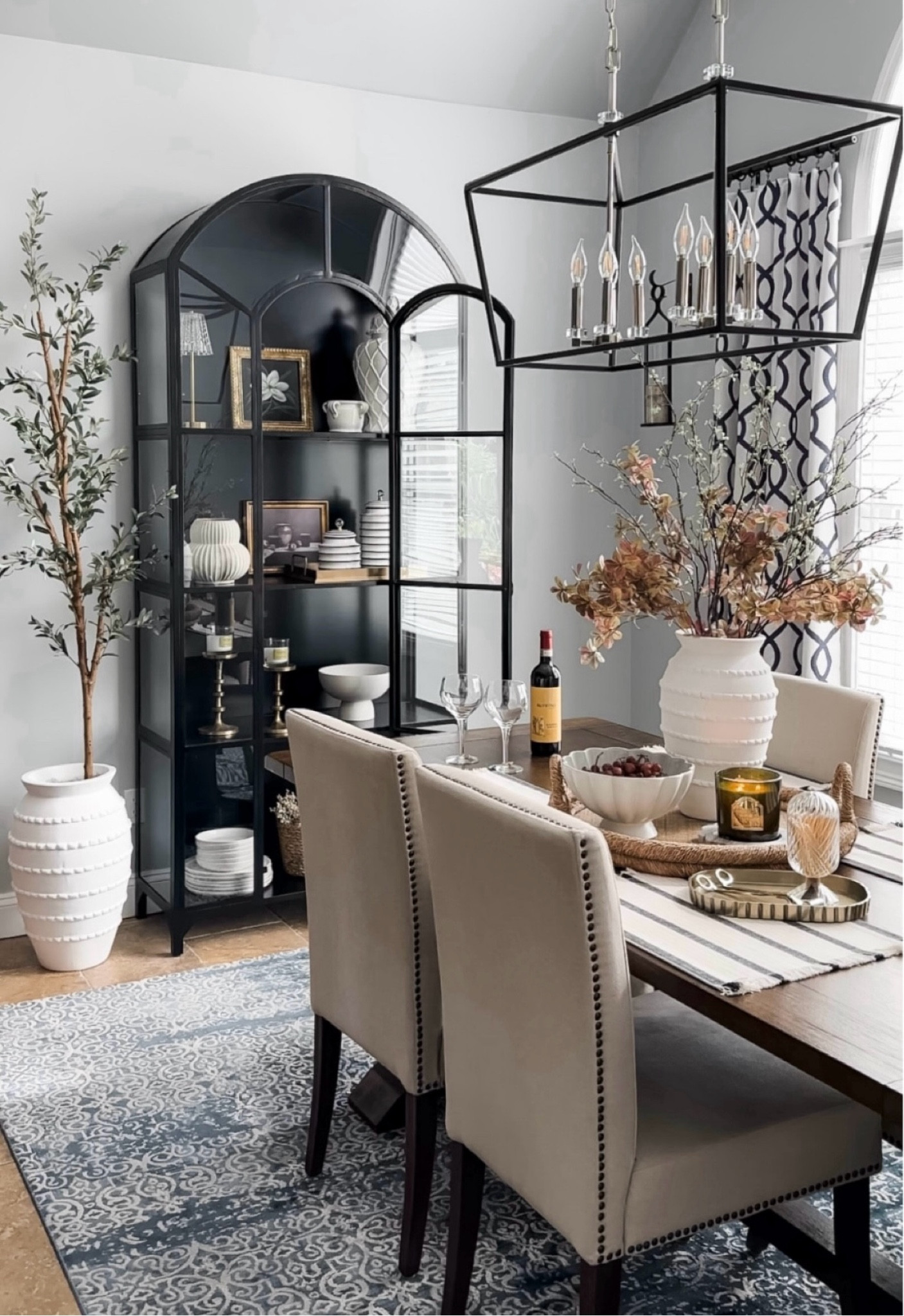 Fall styling dining space. Shop large textured vases, $5 fall florals, olive tree on sale, display cabinet, dining table, dining room, chairs, chandelier, fall home decor accessories. 

#LTKFindsUnder50 #LTKSaleAlert #LTKHome
