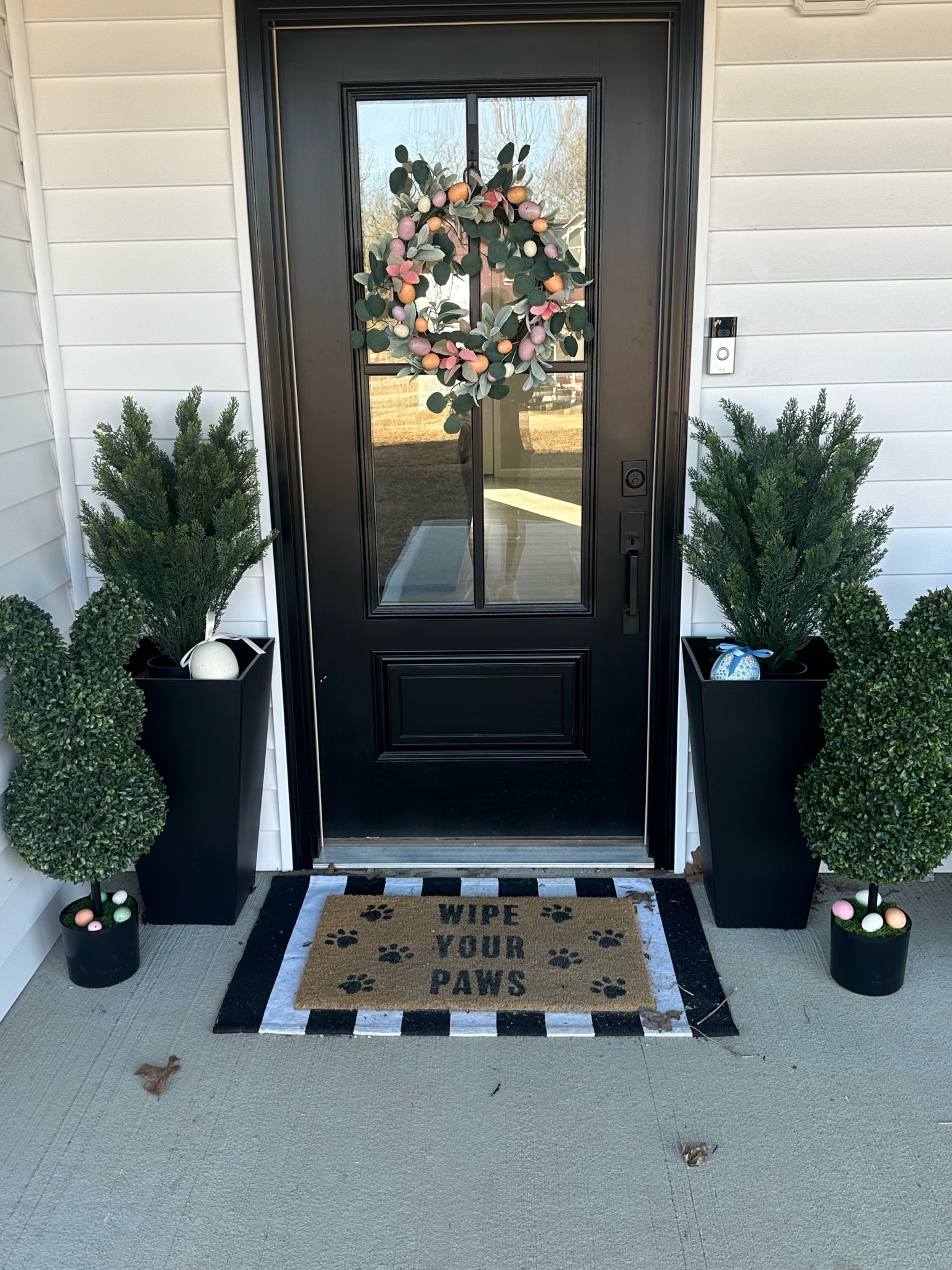 Easter front porch decor #easterdecor #outfoordecor #springoutdoordecor 

#LTKStyleTip