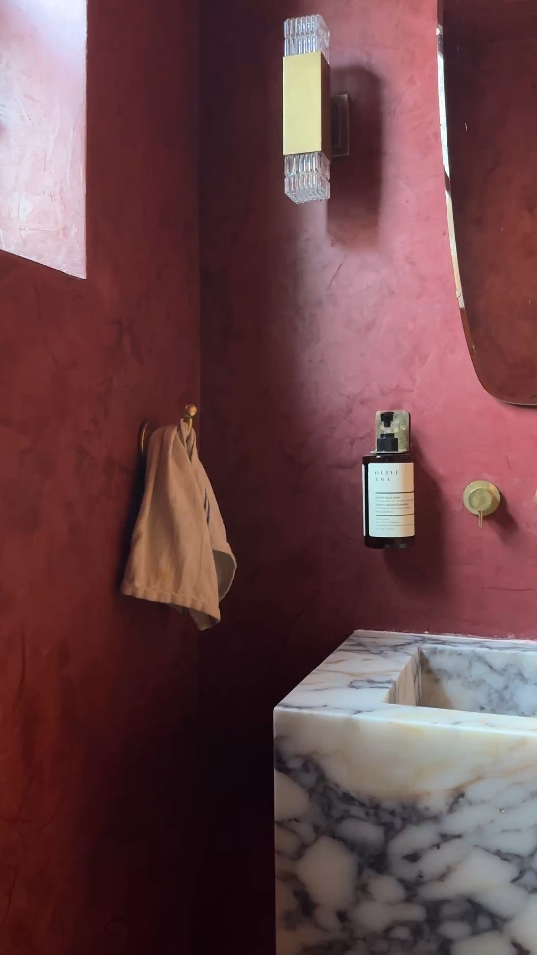 The lime wash color we chose is called Rouge de Venise and can be purchased from Ressource Paints. We applied it using the burnished method with a coat of wax. See below to see sources for the lights, mirror, sink, hooks and faucet. 

#LTKWatchNow #LTKMostLoved #LTKHome