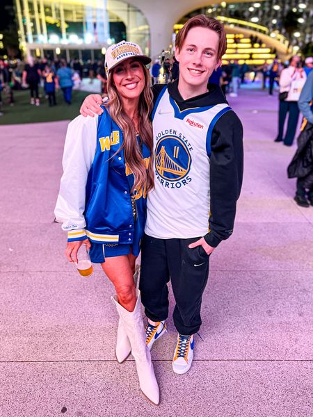 Warriors outfit cowboy boots bomber varsity jacket basketball game outfit. Not my exact jacket, but linked up some similar options, some on sale! HOLLIE30 to save on boots did a large in jersey for a more dress like fit lg in jacket 

#LTKfamily
