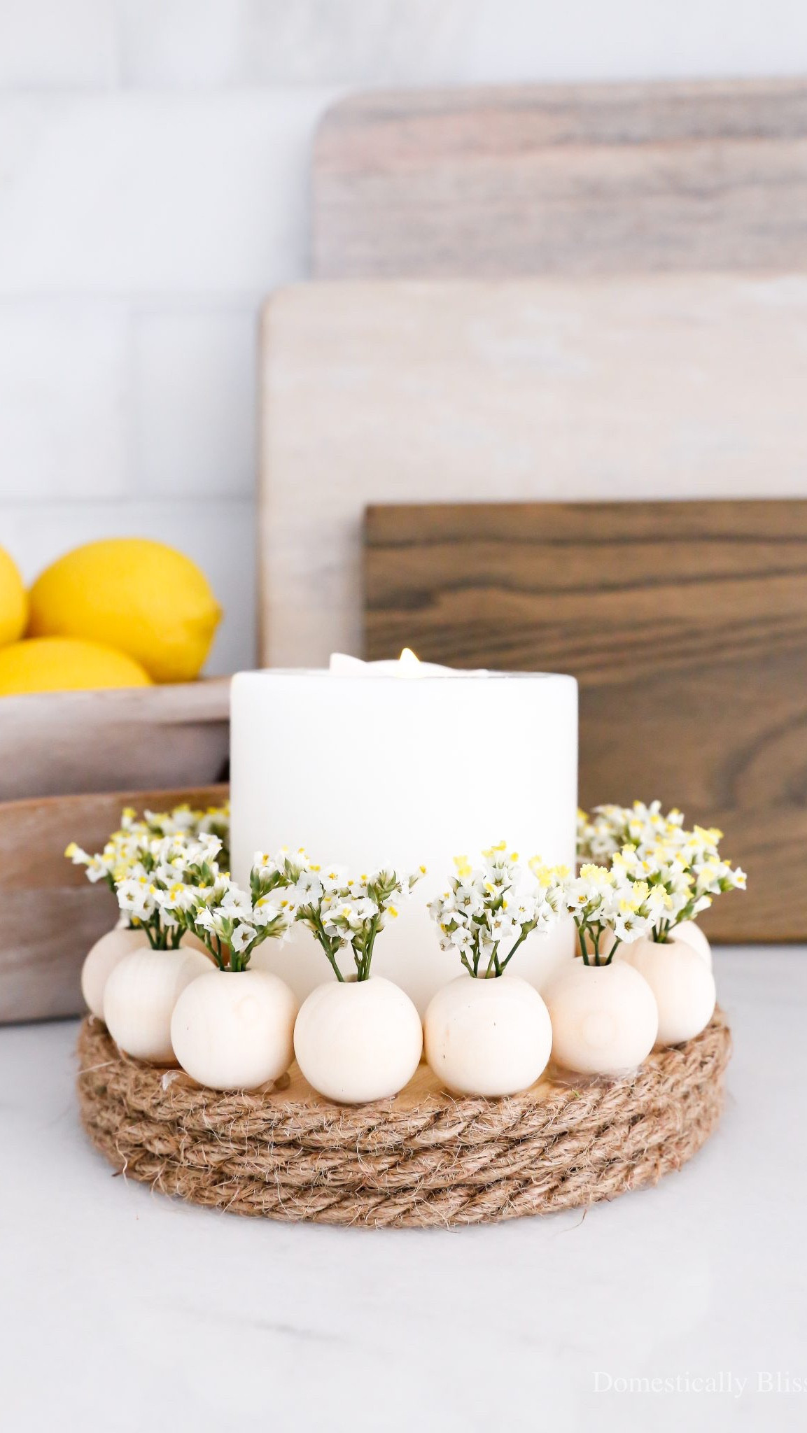 A simple DIY Wood Bead Candle Holder with a flameless candle to enjoy with your favorite flowers this spring and summer.

See tutorial:
https://domesticallyblissful.com/diy-wood-bead-candle-holder/

🔗 Join our newsletter: https://domesticallyblissful.com/newsletter/ 

#LTKWedding #LTKHome #LTKSeasonal