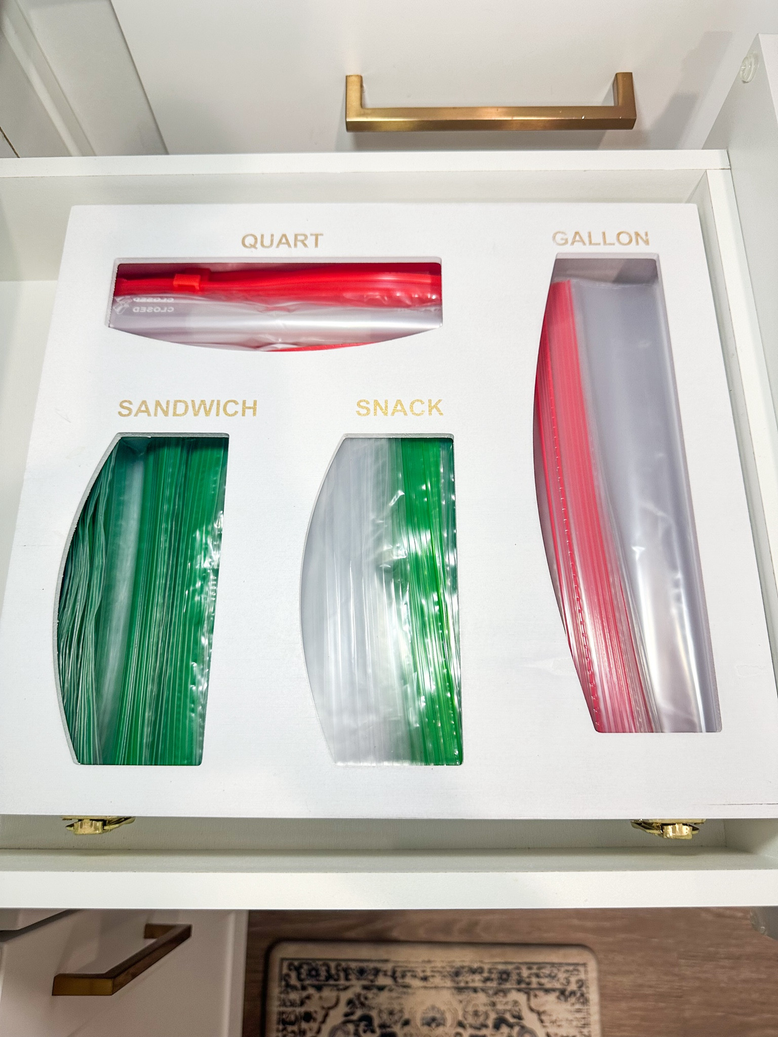 There's nothing worse than baggie boxes that get stuck in shallow kitchen drawers, am I right? THIS solves that problem and makes retrieving bags SO much easier! #homeorganization

#LTKHome #LTKFindsUnder50 #LTKFamily