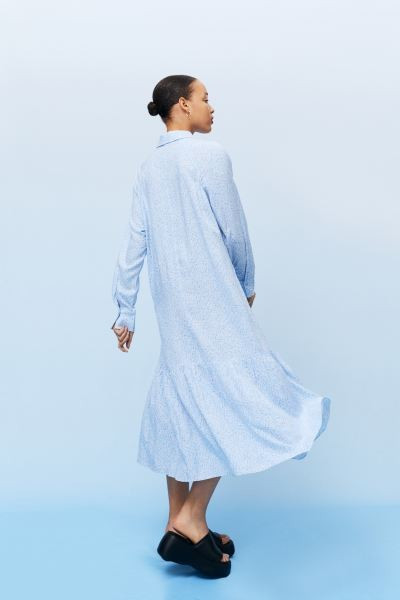 Conscious choice  Calf-length dress in woven viscose fabric with a printed pattern. Collar, conce... | H&M (US + CA)