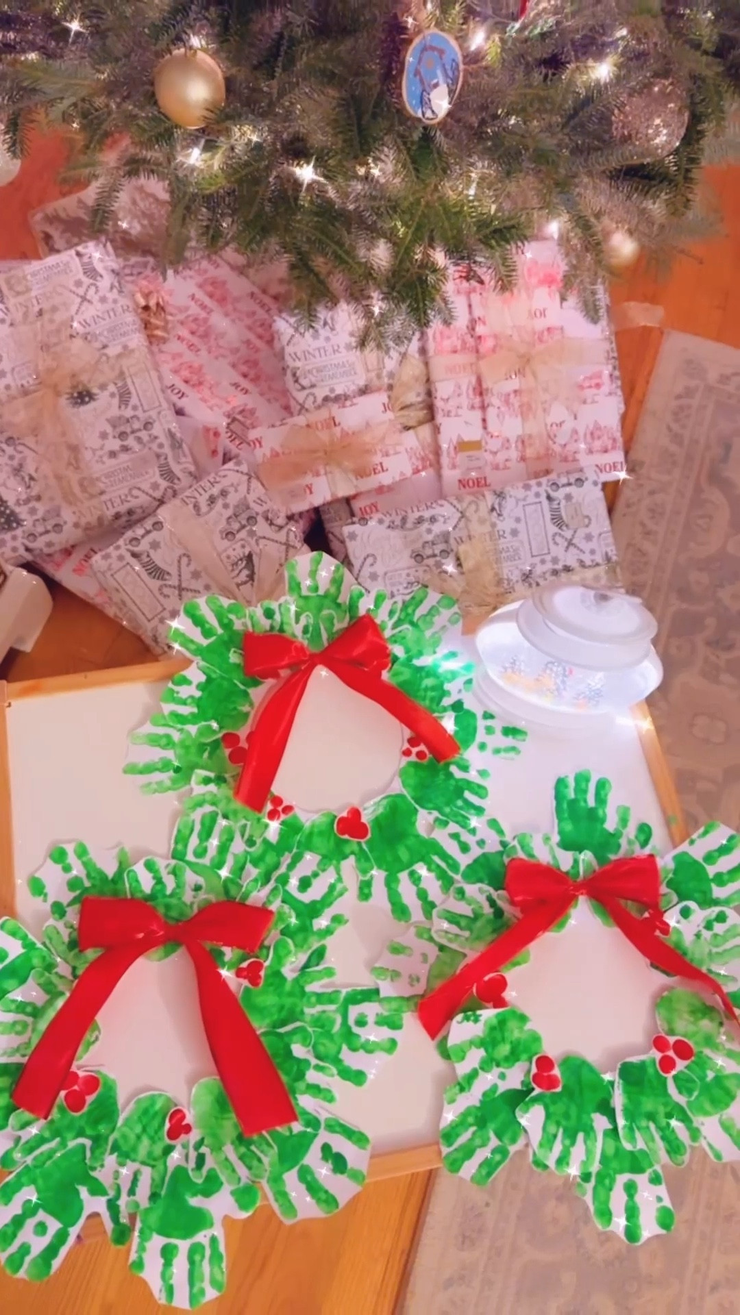And eek!!! Look how stinking adorable these handprint Christmas wreaths turned out!! 😍🌲❤️ I combined Judson and Sweet Baby Levi Rhett’s handprints into one wreath (x3!!) and used their little fingerprints to make the holly berries!! 🥰 And the red ribbon bows are the perfect final touch!! 👌🏽 I adore a sweet Christmas keepsake and know the grandparents will, too!! 🎁

#LTKHoliday