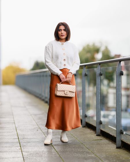 Everyday Look City Day Out Look Casual Look Autumn Outfit Cream Cardigan Brown Orange Satin Midi Skirt Beige Ankle Boots 

#LTKstyletip #LTKover40 #LTKSeasonal