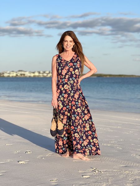 This floral maxi dress was perfect for my beach vacation. I wore it from sunrise to after sunset and was comfortable and confident in it. The pleats at the waist are figure flattering. It’s so versatile that I could also wear it to brunch, showers, Easter, or even just running errands.

Let’s talk about sizing… The dress comes in misses, petites and women’s sizes. I’m 5’2” and would normally wear a petite XS, but I’m wearing a regular XS for a little longer length. 

I paired the spring and summer dress with a coral color lightweight sweater shrug to cover my arms when the temperature dipped. It’s great to have on hand for cold restaurants too and comes in several color options.

The cute navy espadrilles were fun for this dress, but will be cute for wearing with jeans, pants and others dresses too. They run tts, and I’m wearing my regular 6.5.

#beachvacation #petitefashion #resortwear #vacationoutfit 

#LTKSeasonal #LTKstyletip #LTKover40
