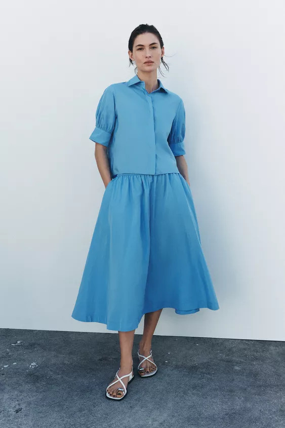 ZARA WOMAN COLLECTIONShort sleeve shirt with lapel collar and voluminous sleeves. Front button cl... | Zara US