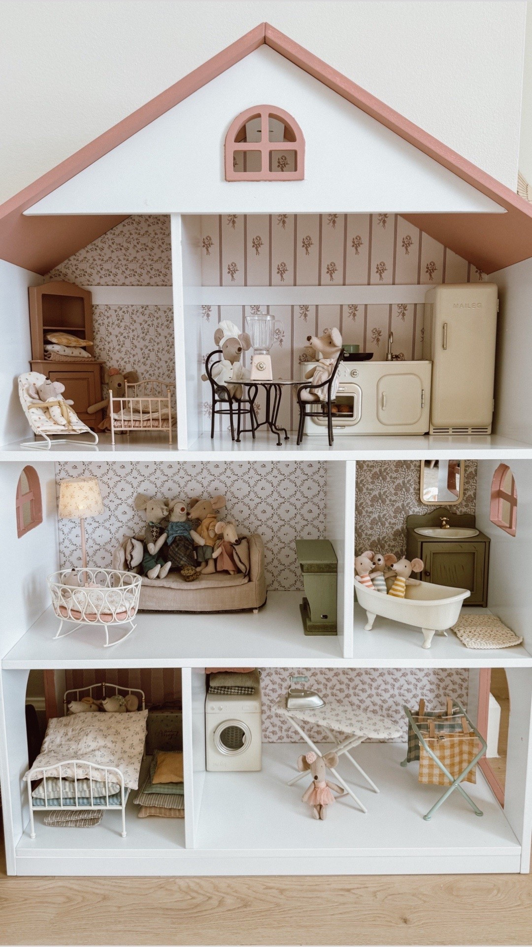 Similar bookshelf house! We just painted the roof and added wallpaper for her doll house!

#LTKKids