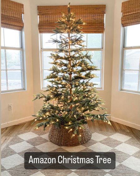Christmas tree. Amazon Christmas. Tree collar. Checkered rug. Boho Christmas tree. Sparse Christmas tree. 

6.5” pre-lit

#LTKHoliday #LTKSeasonal #LTKhome