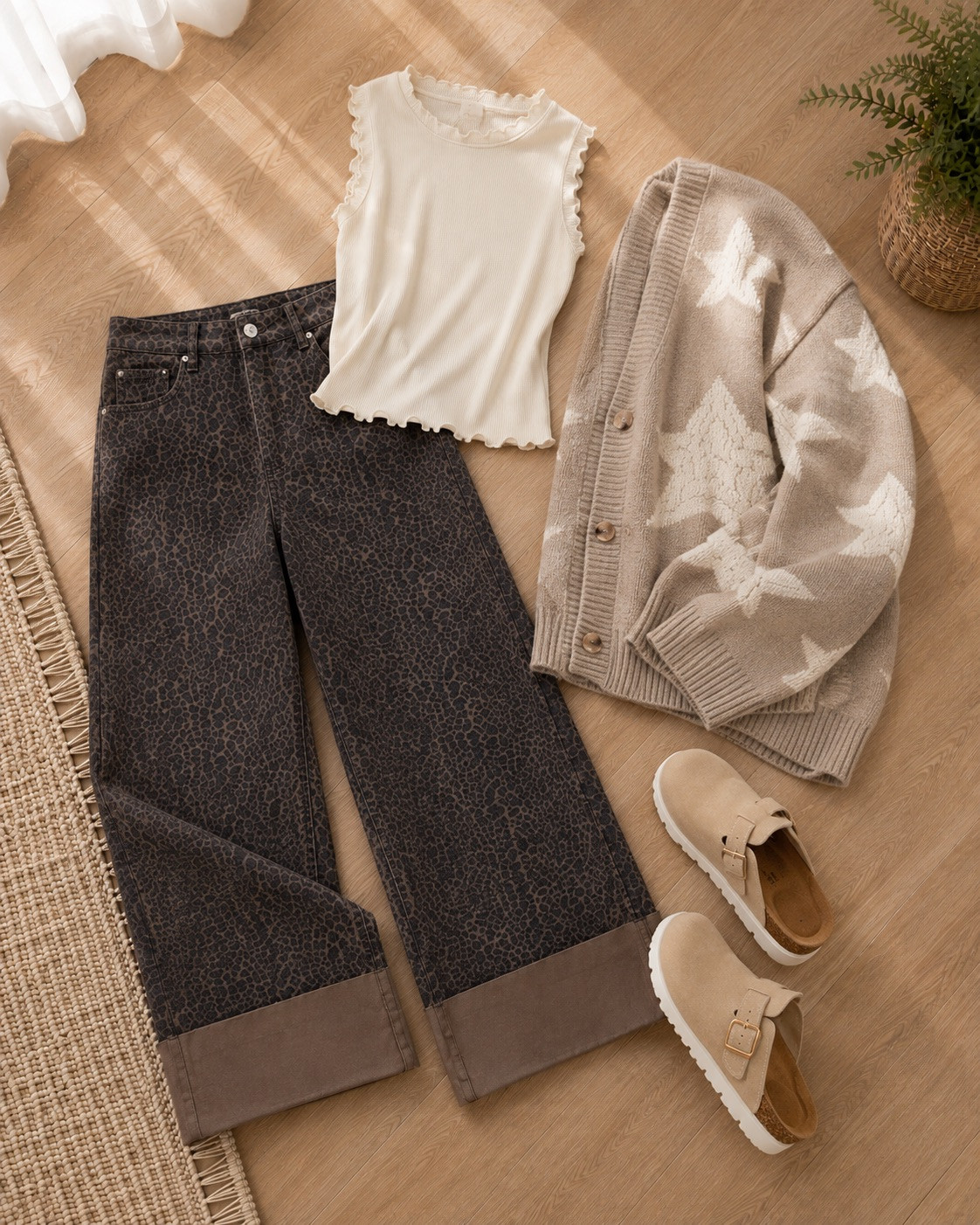 Leopard print is calling my name this fall! These cuffed leopard jeans are so fun paired with a cozy star cardigan and a simple cream lettuce-edge top. Add clogs for the comfiest finishing touch. Perfect for coffee runs, casual errands, or lazy fall afternoons out and about! 

 #LTKootd #LTKmomlife #LTKSeasonal