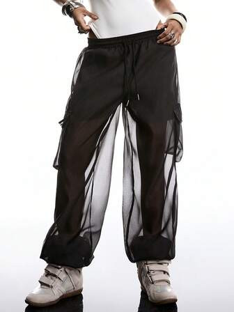 Women’s sheer cargo pants in black | SHEIN