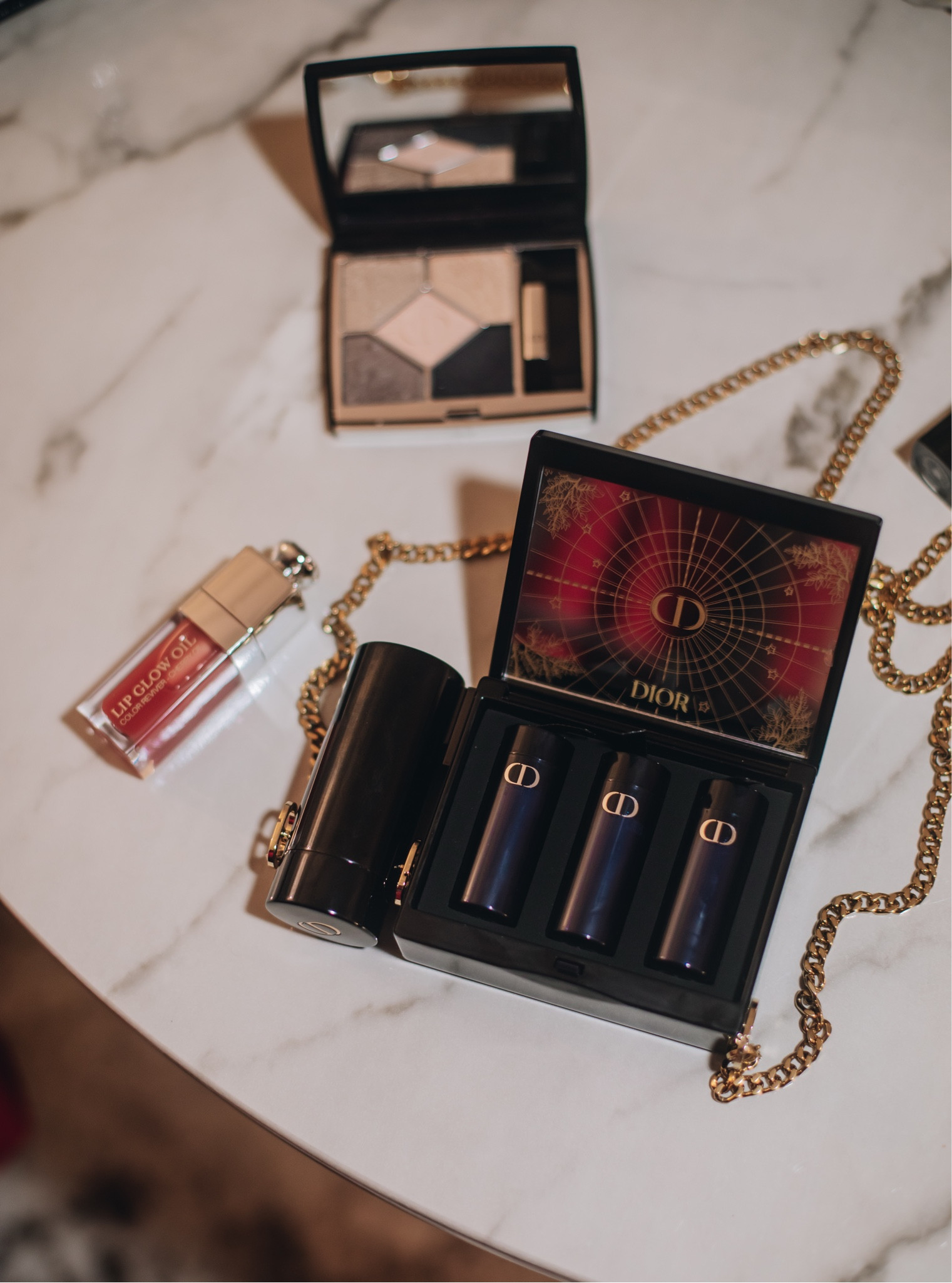  A Dior love story ✨ @diorbeauty 

The Dior Minaudière clutch is the most perfect holiday gift! It’s a limited edition set with 4 lipstick, I am wearing Rouge Dior 965 & eyeshadow palette 359.

And of course I had to complete my look with one of my favorite scents, Miss Dior!

 Use code: Dadouchic22
 Receive a complimentary gift with any purchase of $150 or more.
Enjoy Complimentary Express Shipping on all Orders $125+. Order before 1pm EST on December 20th to receive by December 25th*

#DreaminDior #DiorHoliday

Follow my shop @dadouchic on the @shop.LTK app to shop this post and get my exclusive app-only content!

#liketkit #LTKHoliday #LTKbeauty #LTKGiftGuide
@shop.ltk
https://liketk.it/3Xku8

#LTKGiftGuide #LTKHoliday #LTKbeauty