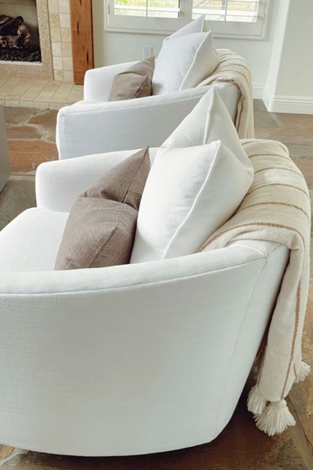 These 12x20 indoor/outdoor pillows look good on these swivel chairs. 

Just have them here for now but will be moving them outside soon. 👏🏻

#throwpillows #swivelchair #livingroomdecor

#LTKfindsunder50 #LTKstyletip #LTKhome