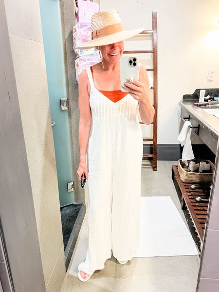 Love this white linen free people swimsuit cover up with a swimsuit, floral sandals, and straw hat. Extra small in the cover-up.

#LTKSeasonal #LTKSwim