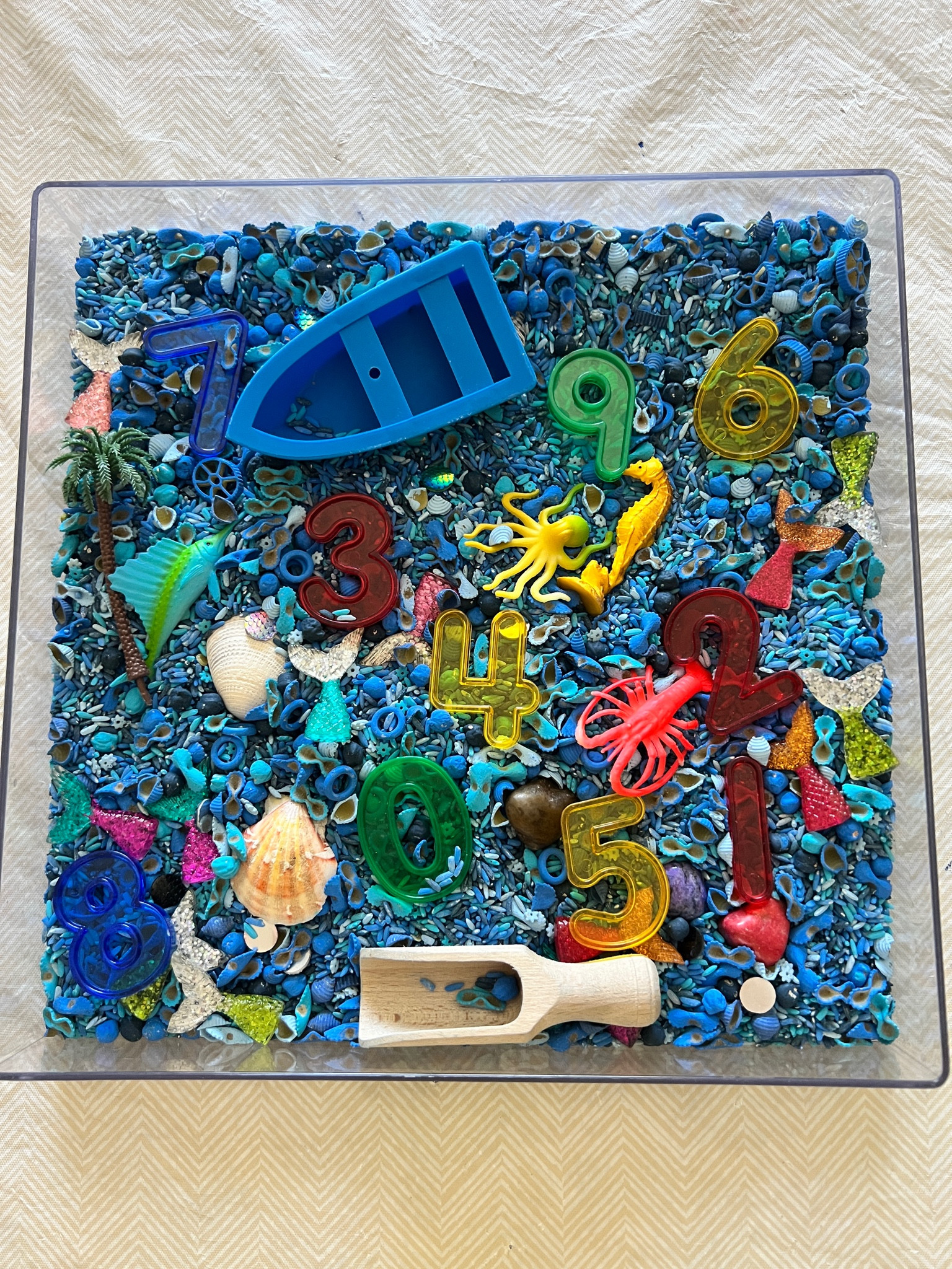 Mermaid counting sensory bin. The filler is from The Sensory Mess. 

#LTKFamily #LTKKids