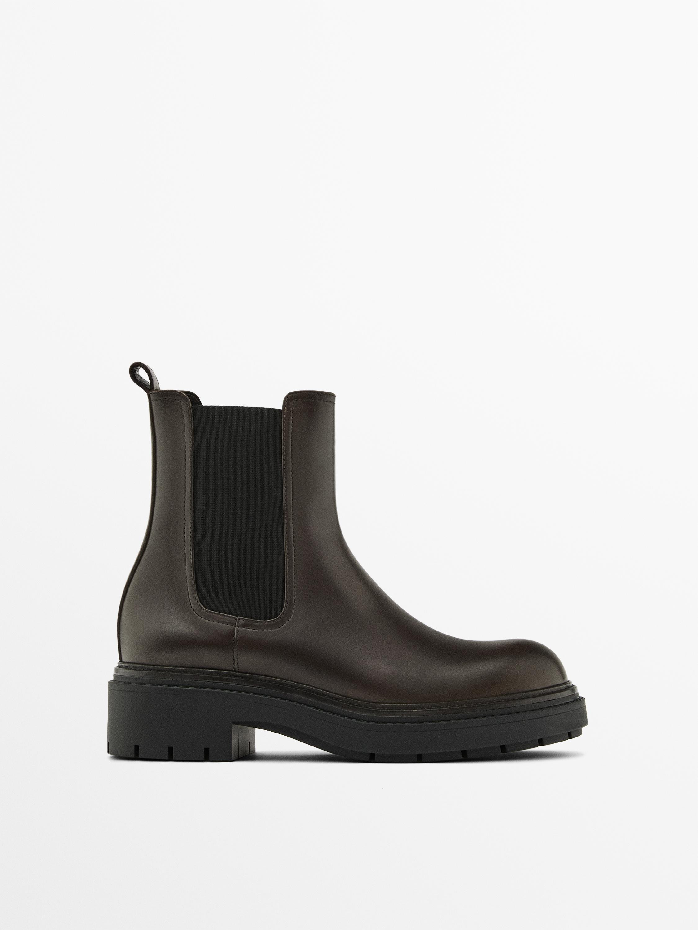 Made of cowhide leather. Chunky sole. Leather lining and insole . Rear pull tab. Elastic detail o... | Massimo Dutti UK