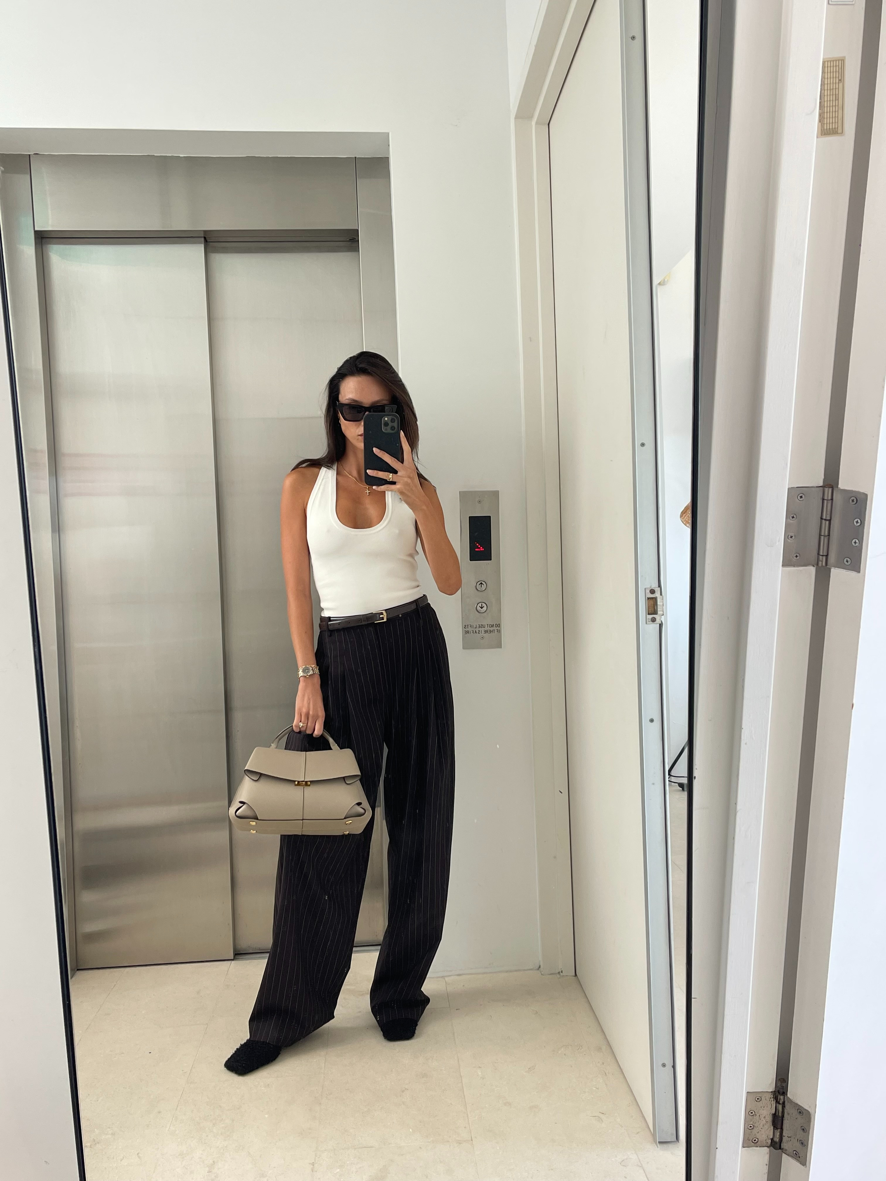 Elevating office style with a timeless combo – Henne white tank and black suit pants 💗 

 #LTKFashionMonth #LTKaustralia #LTKworkwear