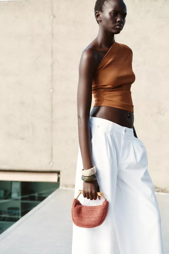 Mini braided bag with a braided body. Metallic gold top handle and a double adjustable and remova... | Zara US