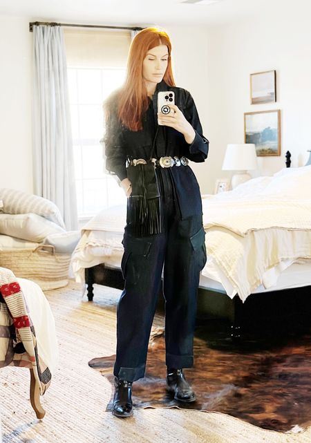 My jumpsuit is on sale 40% off! 
The denim is thick and it’s easy to layer thermals under this jumpsuit. 
It has tons of pockets, which I appreciate, and it’s a very high-end looking denim jumpsuit. It’s something a little different but totally practical. 

#LTKSeasonal #LTKtravel #LTKsalealert