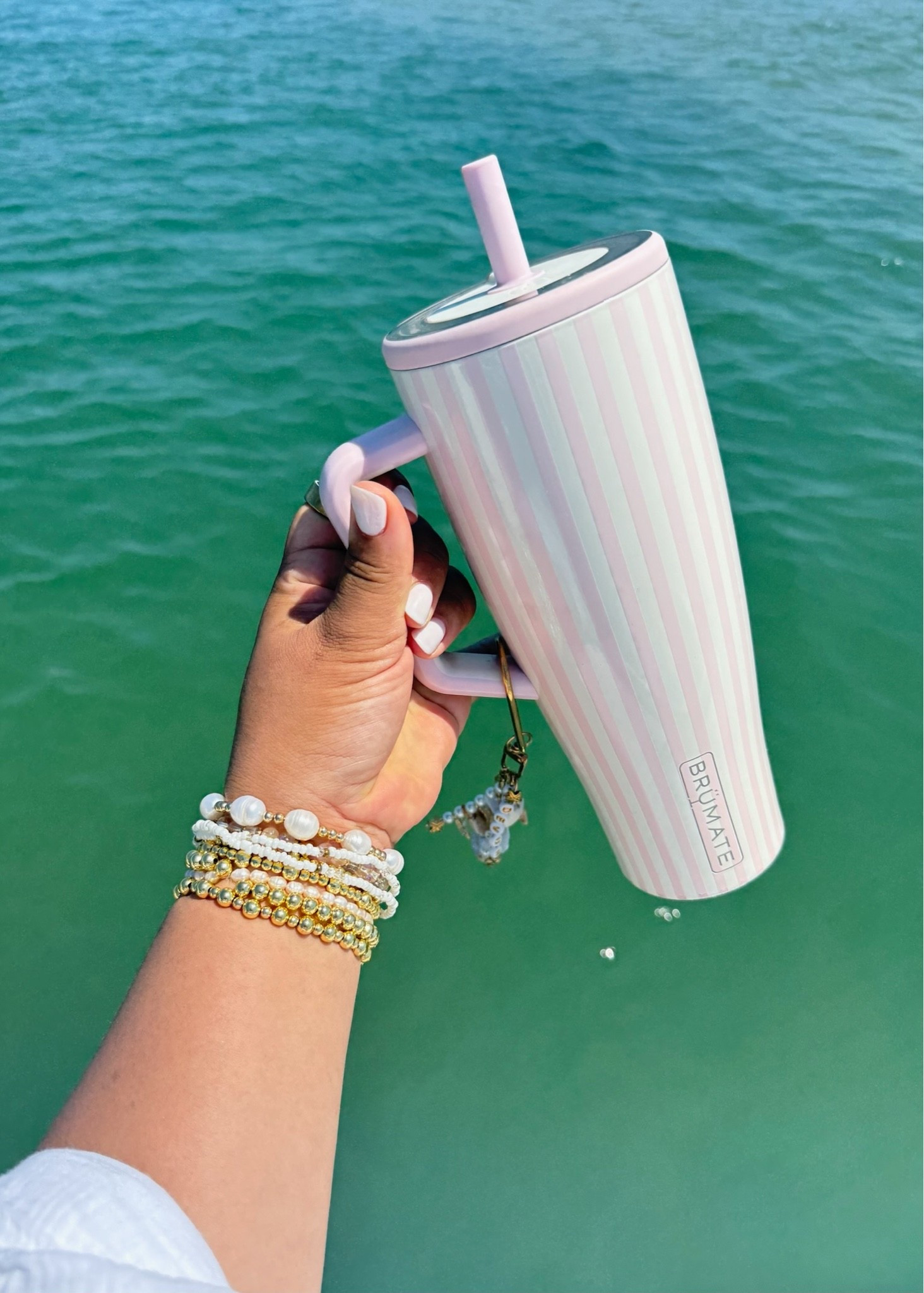 The cutest tumbler for all my iced drinks 💕🥤✨ The pink stripes + handle + straw make it perfect for beach days, pool days, travel & everyday errands. Linking this one because she’s TOO cute! 🎀🌴

Pink tumbler | insulated tumbler | tumbler with handle | reusable cup | travel tumbler | cute drinkware | pink aesthetic | beach essentials | pool day essentials | vacation essentials | summer finds | gift idea for her

#LTKSeasonal #LTKHome