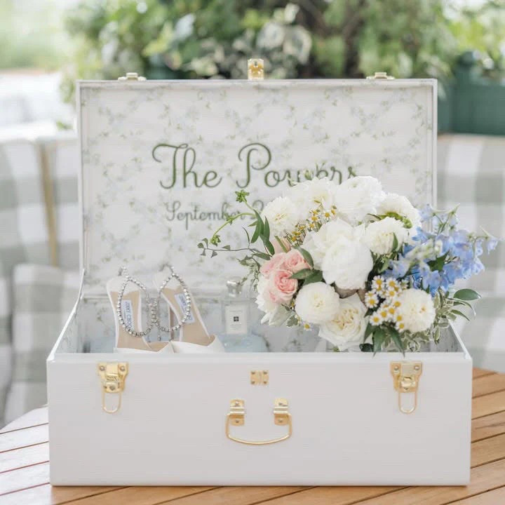 A stunning gift for the Bride! Add this gorgeous wedding keepsake box to your bridal registry or gift guide for your bridal shower. 
As a wedding planner, we always ask the bride to put any special items into a personalized secure box on the wedding day. These items include things like vow books, marriage license, jewelry, love letters, perfume, monogrammed champagne glasses, wedding invitation, etc..
Then we’re able to give that box to the photographer for detail photos, as well as keep everything organized and safe when the wedding night is over. 
So instead of an ugly plastic tote bin, you can have this gorgeous keepsake box not only on your wedding day, but for forever. ❤️

#LTKSeasonal #LTKGiftGuide #LTKWedding