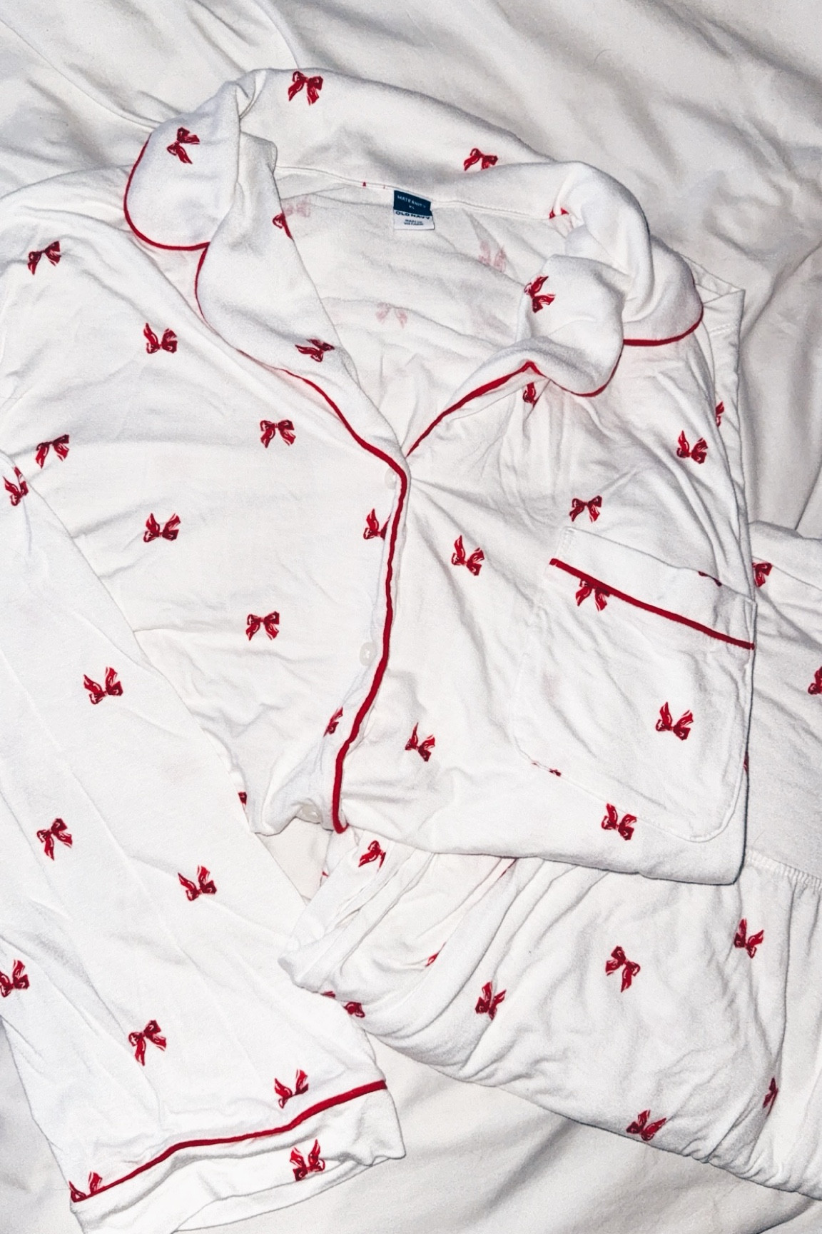 the coziest christmas bow maternity pajamas. so soft, stretchy, and comfortable with a fold over waist for your growing belly. these are still going to be a staple for me even after pregnancy and the holidays! 

#LTKGiftGuide #LTKHoliday #LTKmomlife