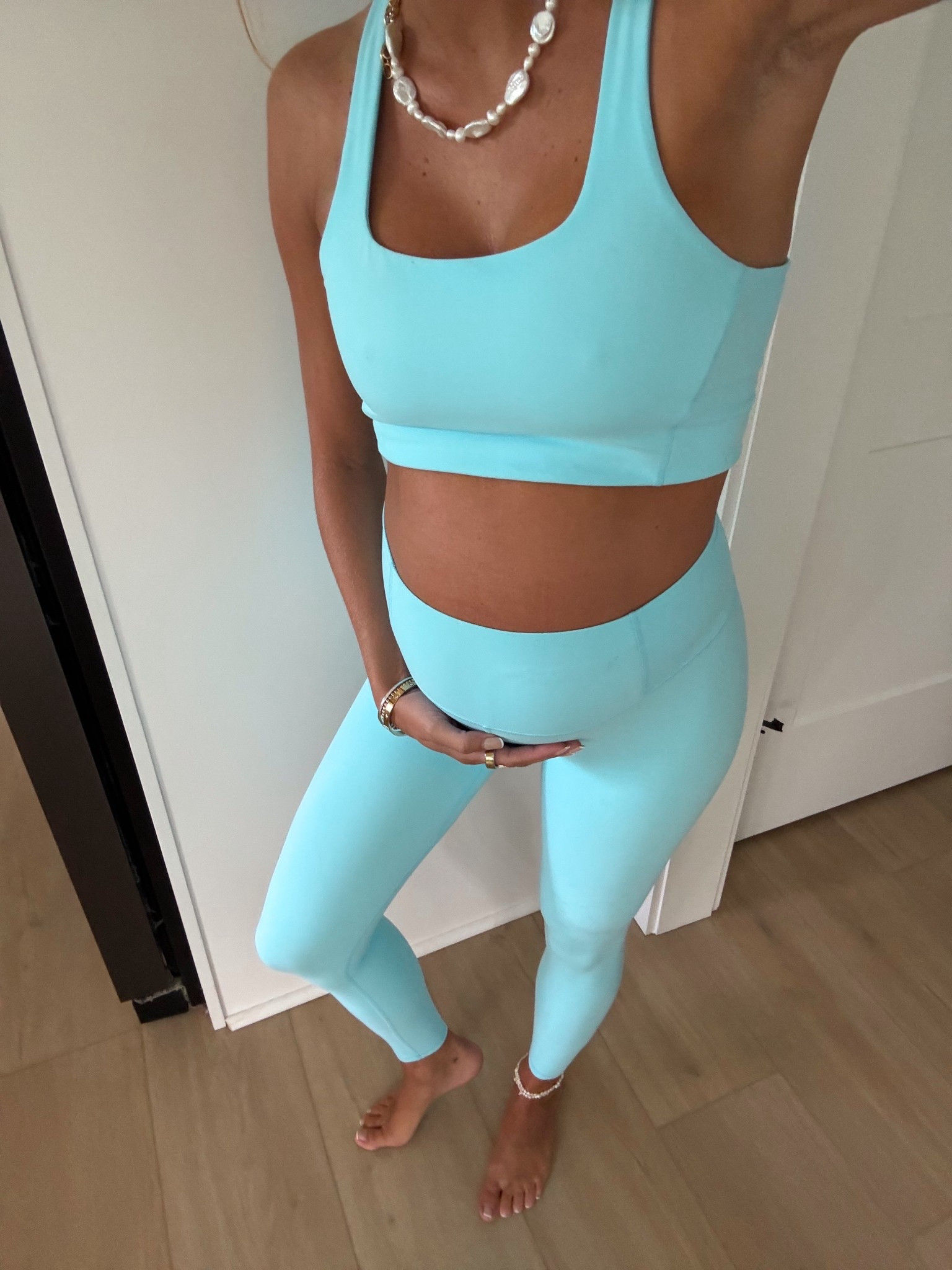 loving this workout set🩵 the cutest color with a summer tan! Wearing size M top and bottom at 8 months pregnant 

#LTKBump #LTKFindsUnder100 #LTKActive