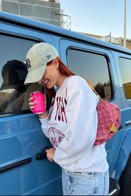 Casual comfy outfit loose blue jeans oversize grey hoodie with Harvard logo pastel green NY cap vintage pleaty denim pink Louis Vuitton bag 

#LTKitbag #LTKstyletip #LTKFind