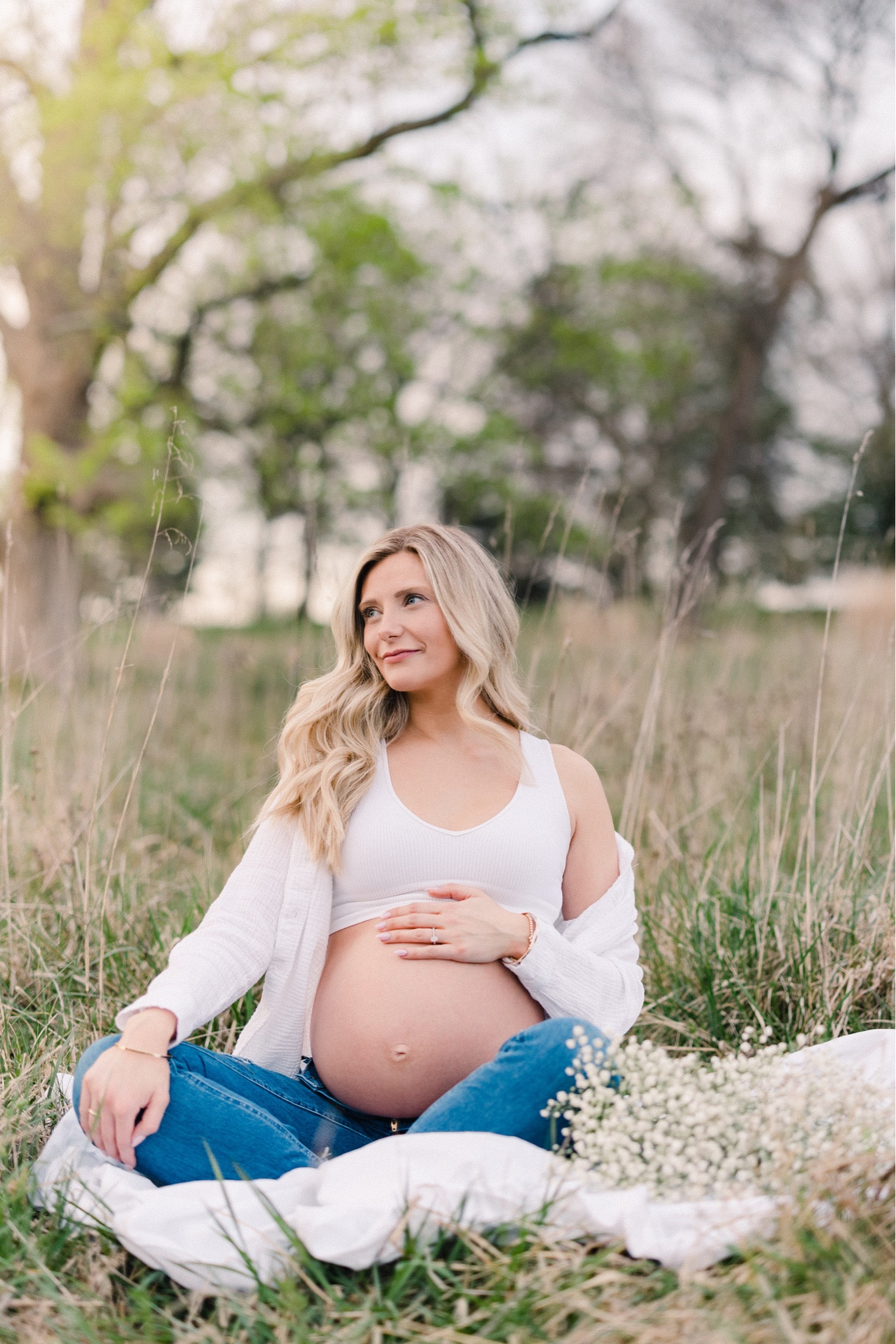 Outdoor Maternity Photo Shoot Outfit! I loved how these pictures came out. This outfit was simple and didn’t take away from the beauty of my growing belly. I think less is more for these photo shoots so I stuck to capsule pieces in my wardrobe with the oversized button down, MOTHER jeans, gold jewelry and cropped tank top. 

#LTKstyletip #LTKbaby #LTKfamily