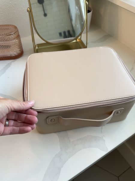 Best travel cosmetic bag! Love the neutral color and perfect for keeping on the counter too 

#LTKBeauty #LTKFindsUnder50 #LTKTravel