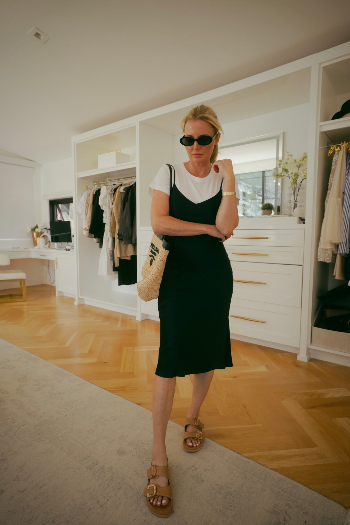 This slip dress is such a great closet staple. It’s made of silk, so it’s much more breathable than a satin slip dress. It’s under $90 AND it’s washable too—no dry cleaning necessary! This is how I’d style it to wear it during the day. I’m wearing size xs. 

#LTKSeasonal #LTKTravel #LTKOver40